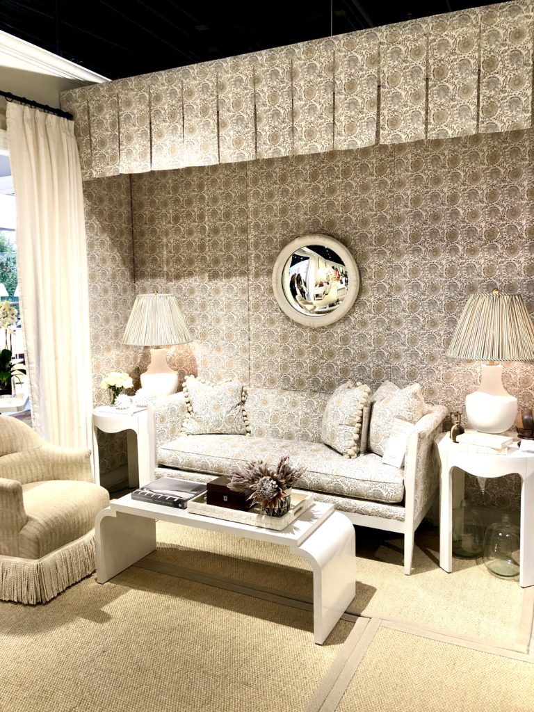 A neutral display of fabrics, furniture, and lighting at High Point Market. Custom lampshades make all the difference. 